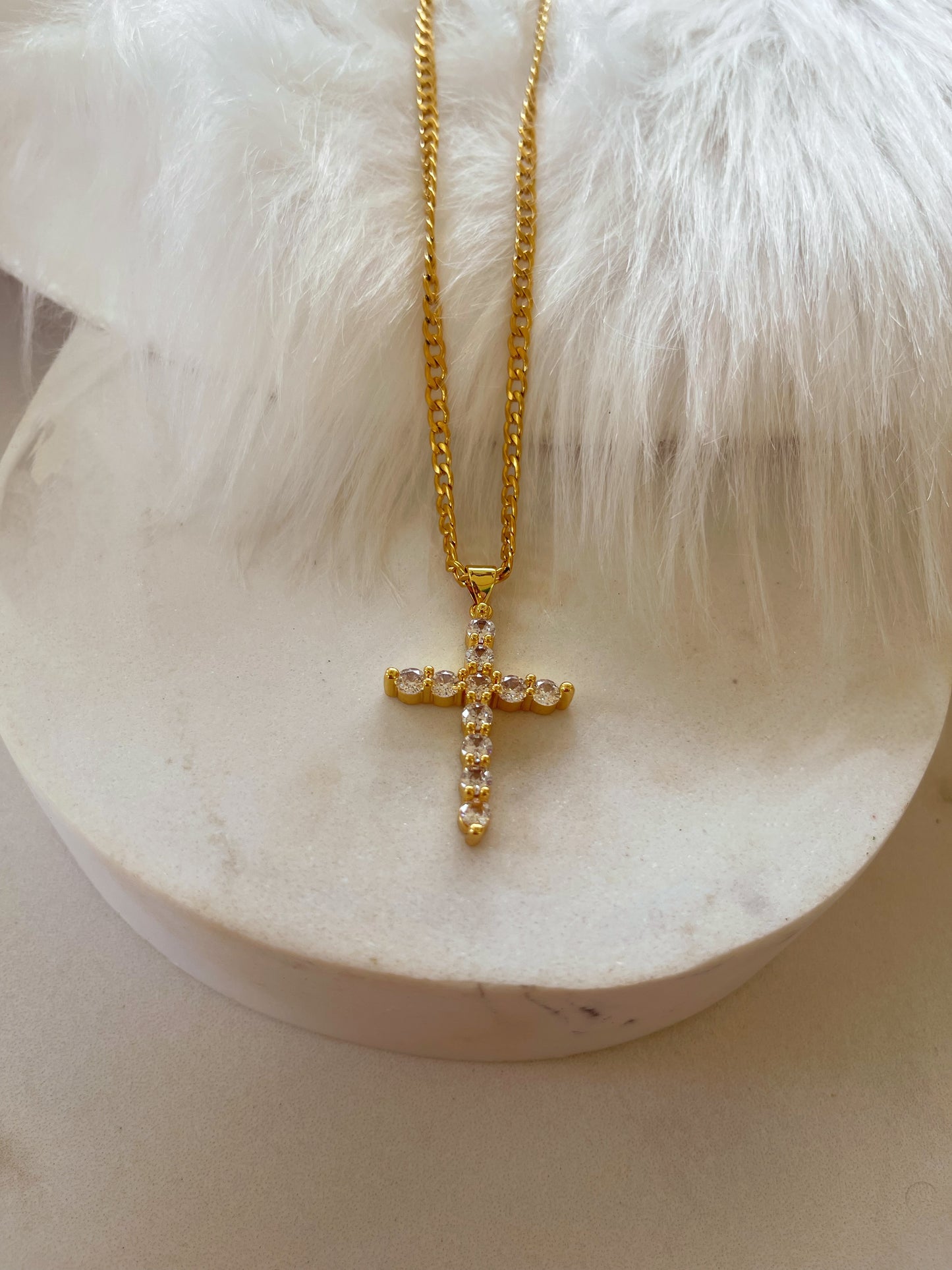 Clarise’s cross necklaces